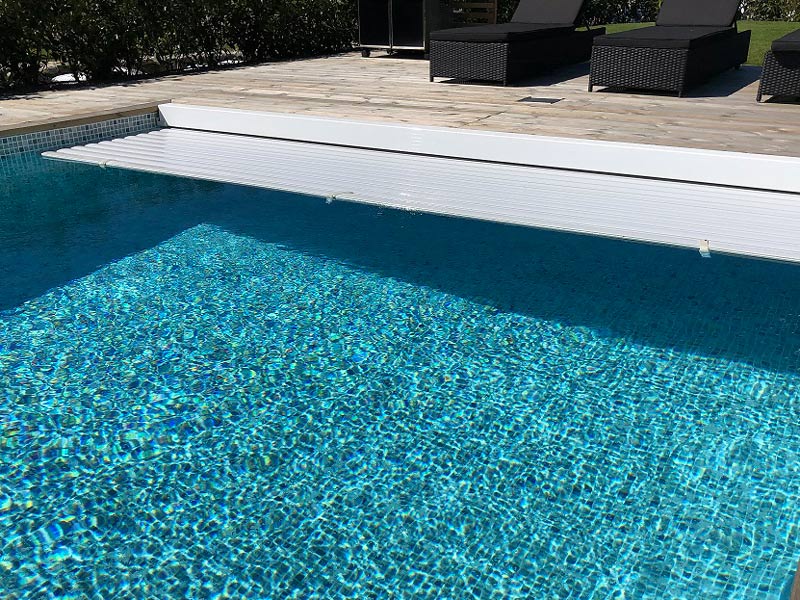 Lamelltäckning på kunds pool